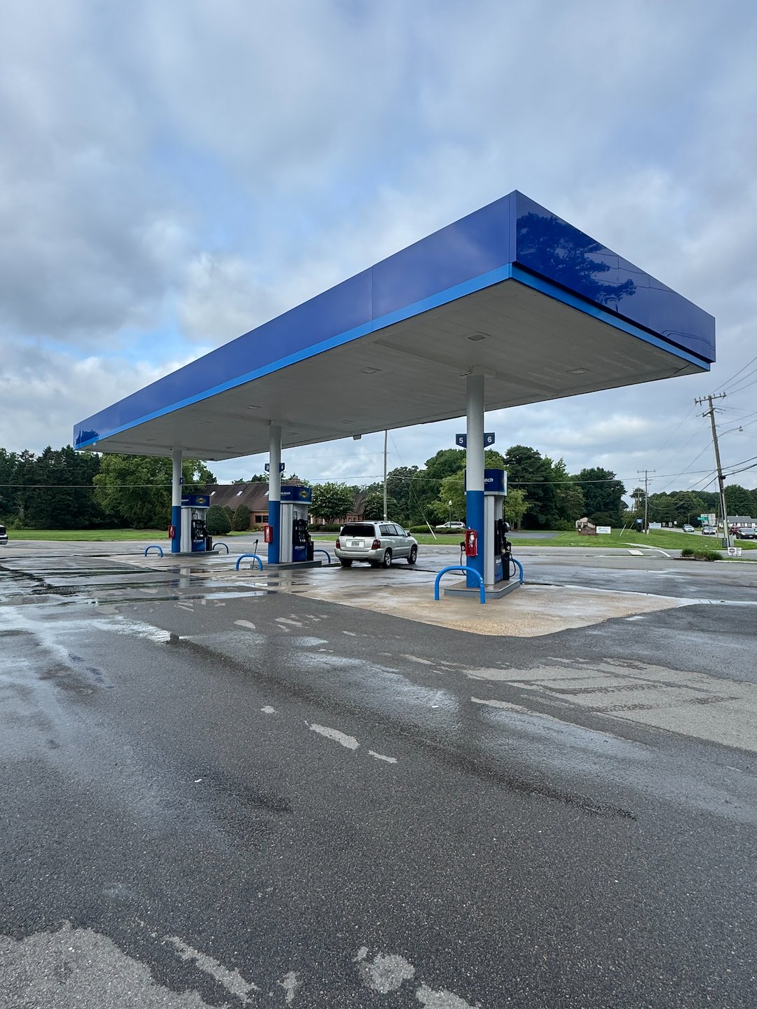 Commercial Soft Washing & Pressure Washing Project in Whitestone, VA | Building, Fuel Pump Canopies & Sidewalk Cleaning. 